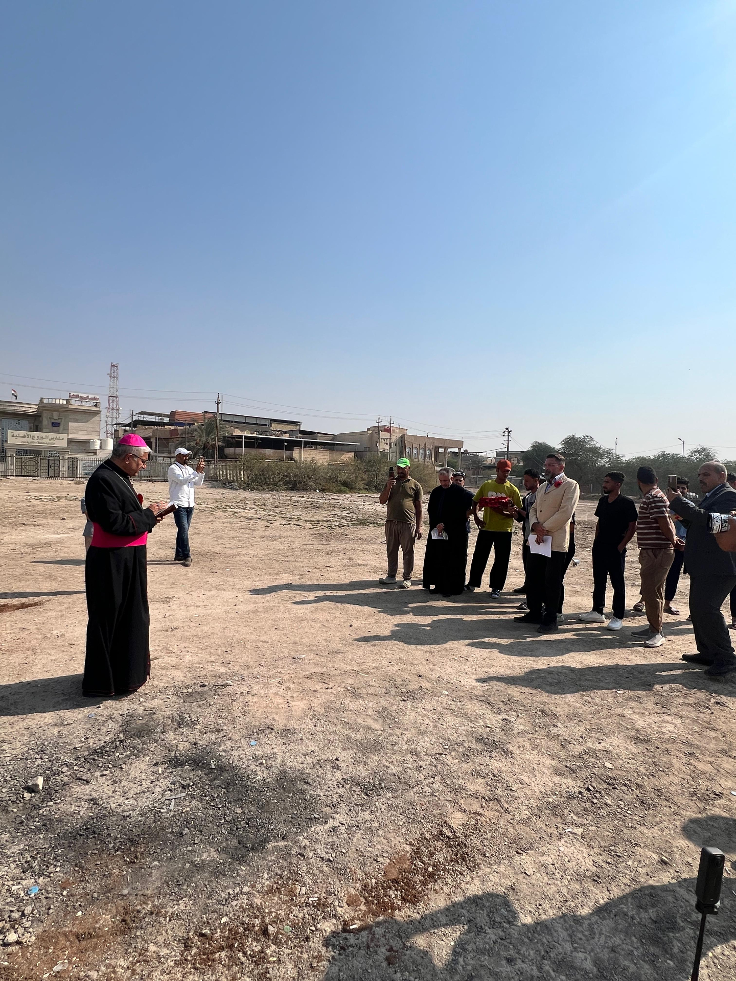 Archbishop Habib Al-Naufali giving blessings at the Remembrance ceremony