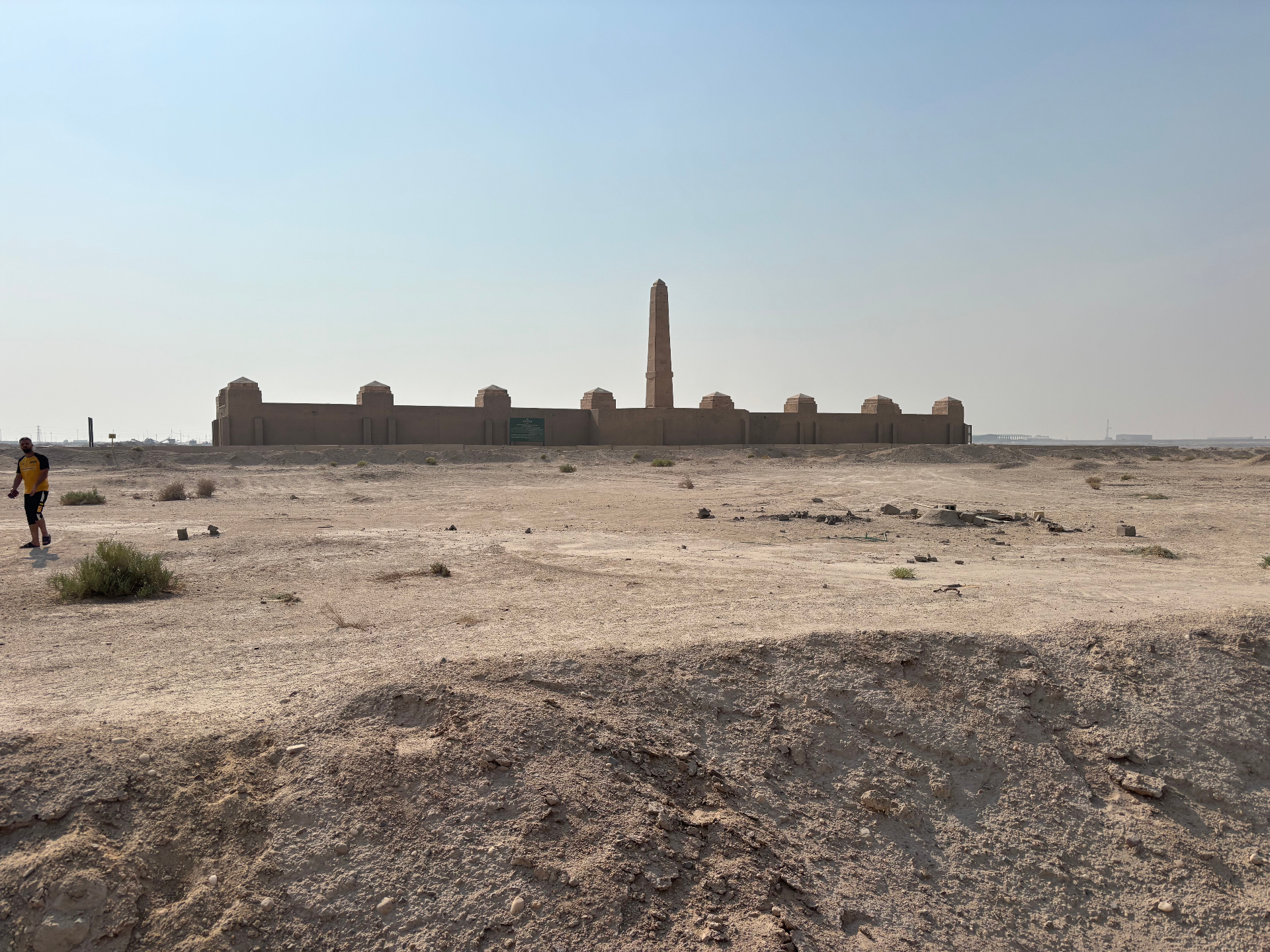Basra Memorial today - distant view showing isolated monument in desert wasteland
