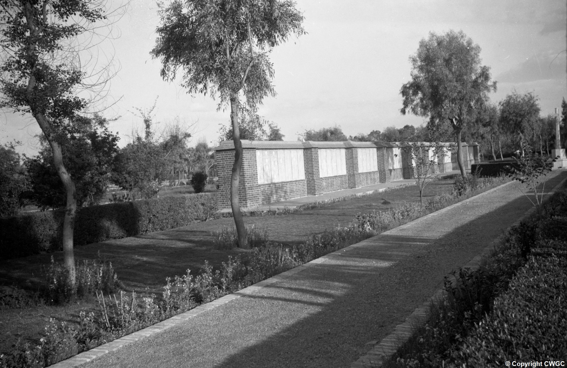 The Basra Memorial Screen Wall with its inscribed panels intact, photographed by the Imperial War Graves Commission.