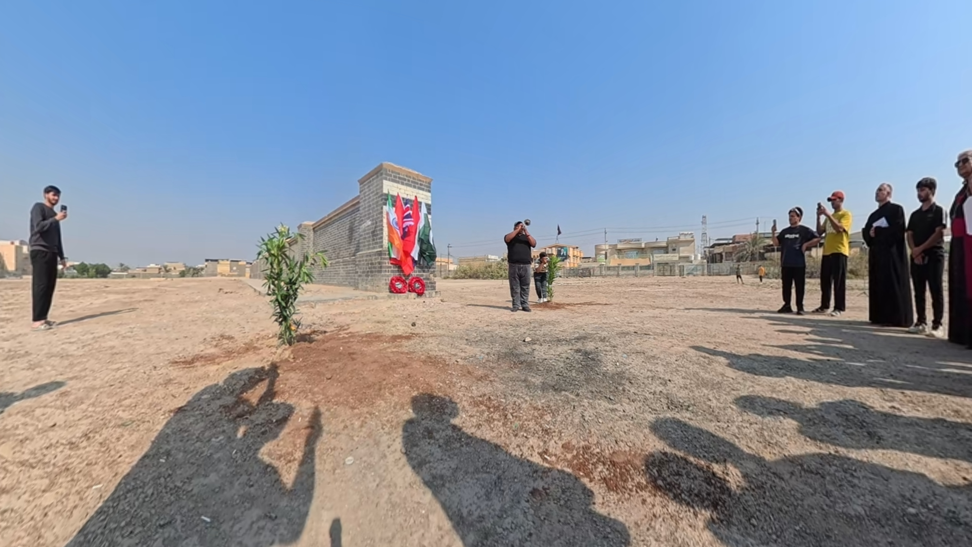 The Last Post being played at Basra Memorial during the two minute silence