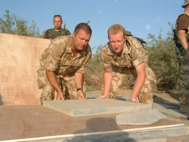 Memorial panels being sorted and stacked during the removal operation.