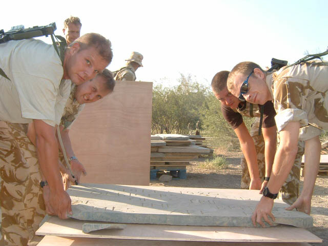 Removed memorial panels being secured on a pallet.