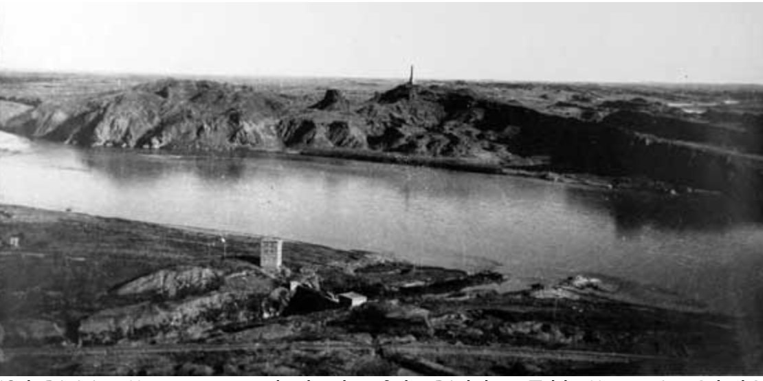 Distant view of the 13th Division Monument on its hilltop above the Diyala River, with the surrounding landscape of Jebel Hamrin.