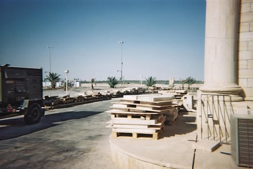 Removed panels and gravestones in storage at Saddam Hussein's former palace, Basra 2003.